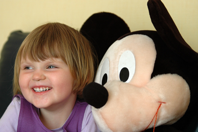 Victoria and Mickey Mouse watching The Tweenies